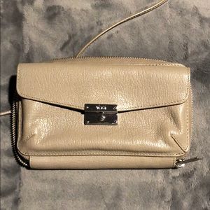 Tumi clutch